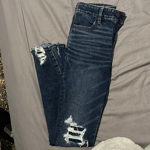 American Eagle Hi-Rise Jegging, size 2. Lightly distressed.